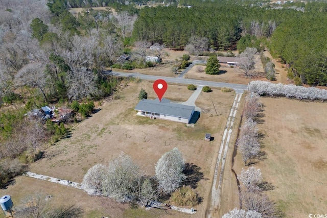 aerial view featuring a forest view