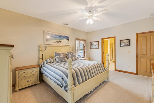 bedroom with light carpet, visible vents, a ceiling fan, and baseboards