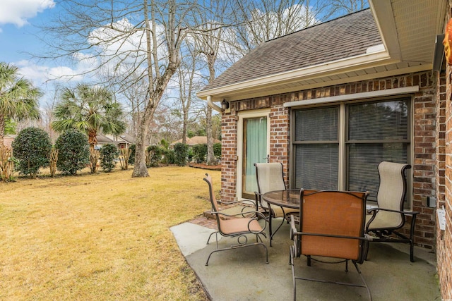 view of patio featuring outdoor dining area