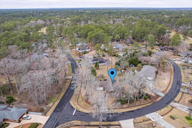 drone / aerial view with a forest view