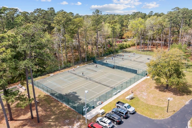 aerial view featuring a wooded view