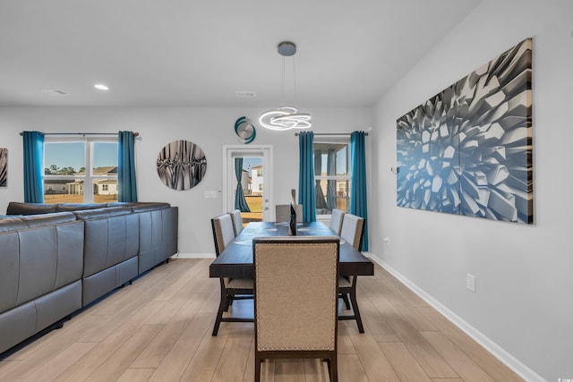 dining area with visible vents, recessed lighting, baseboards, and light wood-type flooring