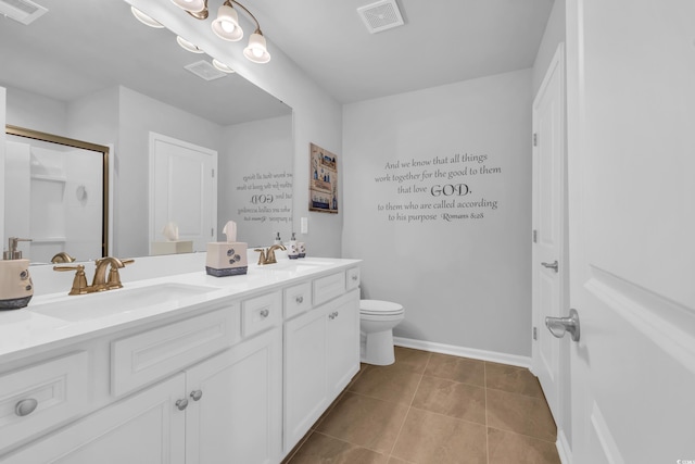 full bathroom with tile patterned flooring, visible vents, and a sink