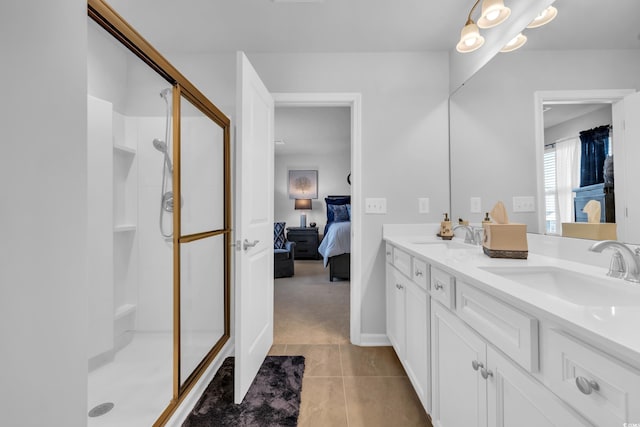 bathroom featuring a sink, ensuite bath, a shower stall, and tile patterned flooring