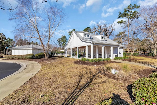 exterior space featuring metal roof