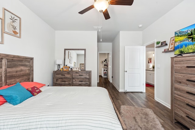 bedroom featuring a ceiling fan, dark wood-style floors, and baseboards