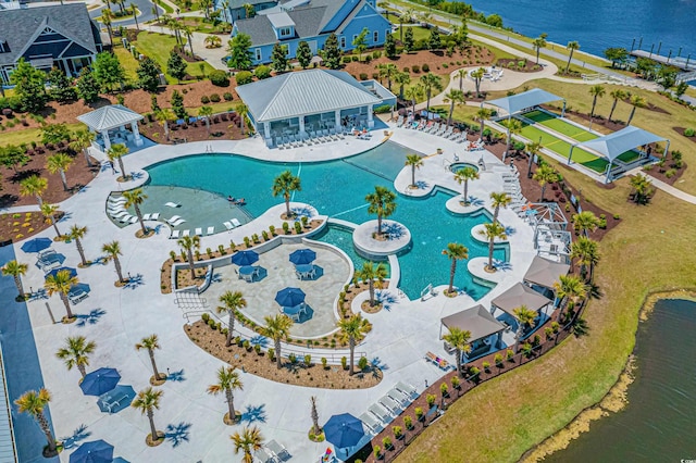 birds eye view of property featuring a water view