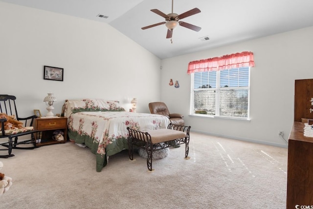 bedroom with vaulted ceiling, visible vents, and carpet floors