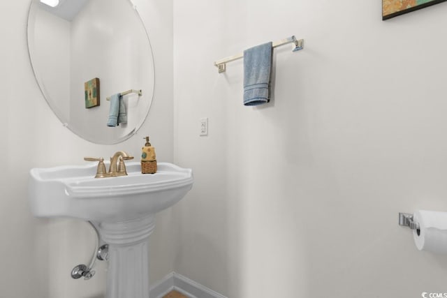 bathroom featuring baseboards