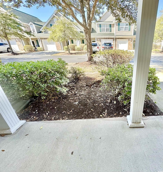 view of yard featuring a residential view