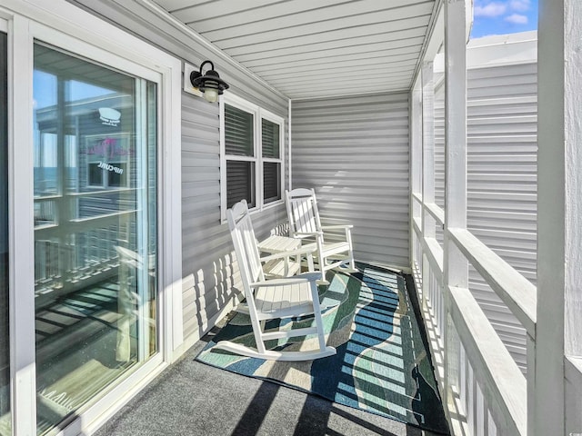 balcony featuring a porch