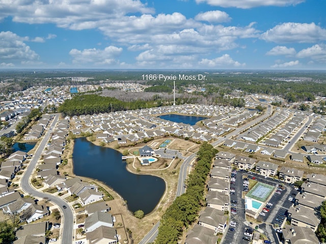 bird's eye view featuring a residential view and a water view