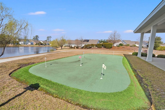 view of home's community featuring a residential view and a water view