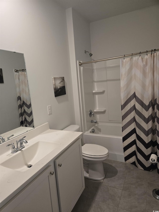 bathroom featuring tile patterned flooring, shower / tub combo with curtain, toilet, and vanity