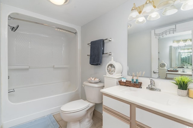 bathroom with toilet, bathtub / shower combination, vanity, and tile patterned flooring