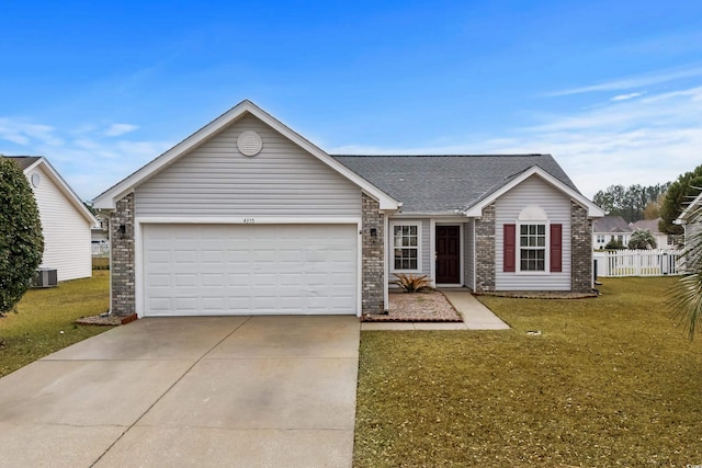 ranch-style home with brick siding, concrete driveway, a garage, and a front yard