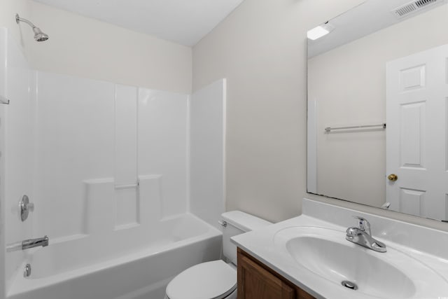 bathroom featuring vanity, toilet, bathtub / shower combination, and visible vents