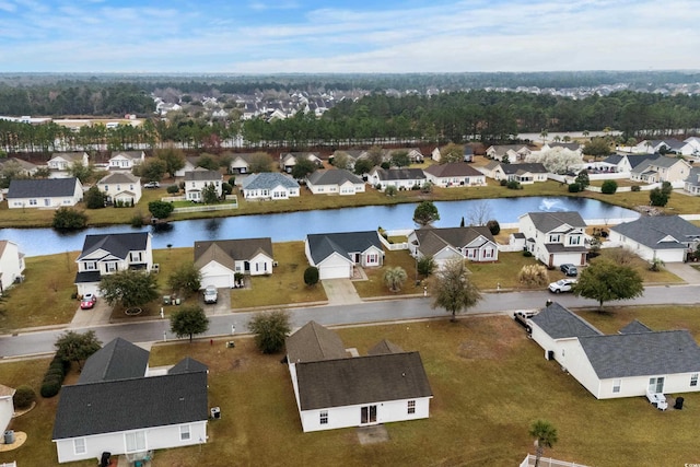 aerial view featuring a residential view and a water view