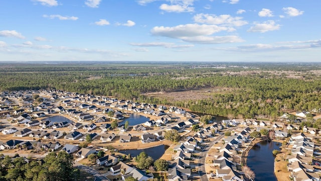 aerial view featuring a residential view and a water view