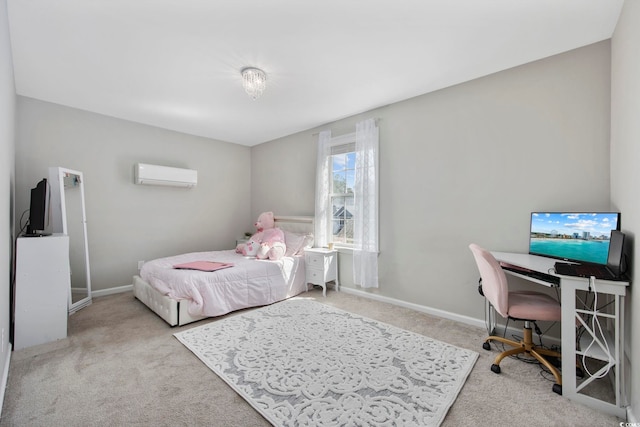 carpeted bedroom with baseboards and a wall mounted air conditioner