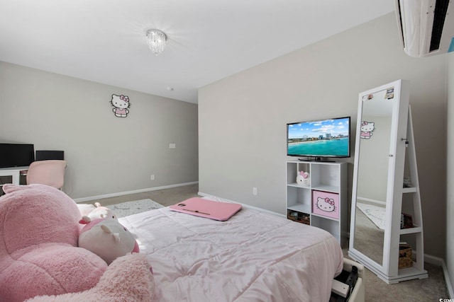 carpeted bedroom featuring baseboards