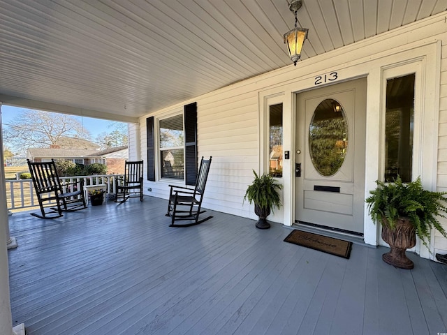 property entrance with a porch