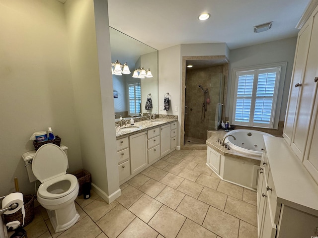 bathroom with a sink, visible vents, a stall shower, and a whirlpool tub