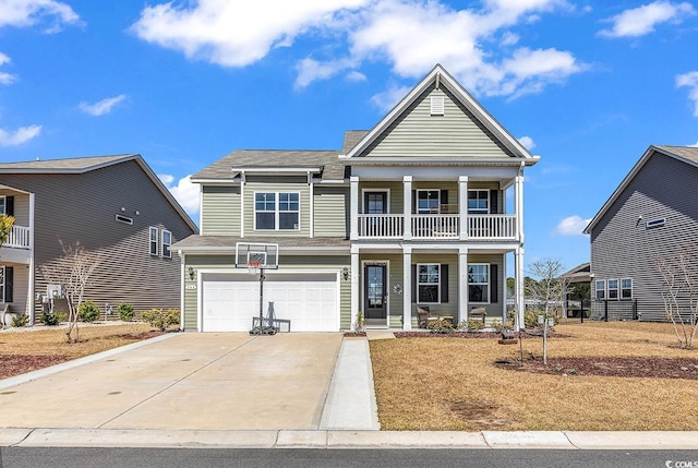 view of front of house featuring concrete driveway, a balcony, a porch, and a garage