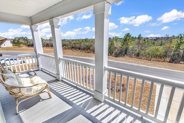 wooden deck with a porch