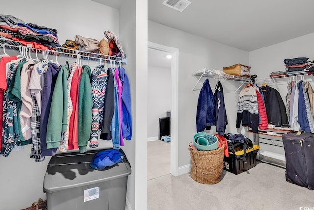 spacious closet with carpet and visible vents