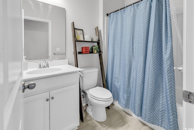 full bath with tile patterned floors, toilet, and vanity