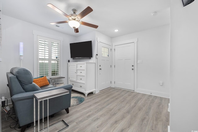 2406 Seabreeze Pl, Myrtle Beach, SC 29577 - living area featuring light wood-style floors, a ceiling fan, and recessed lighting