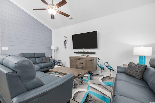 2406 Seabreeze Pl, Myrtle Beach, SC 29577 - living area with a ceiling fan, lofted ceiling, and wood walls