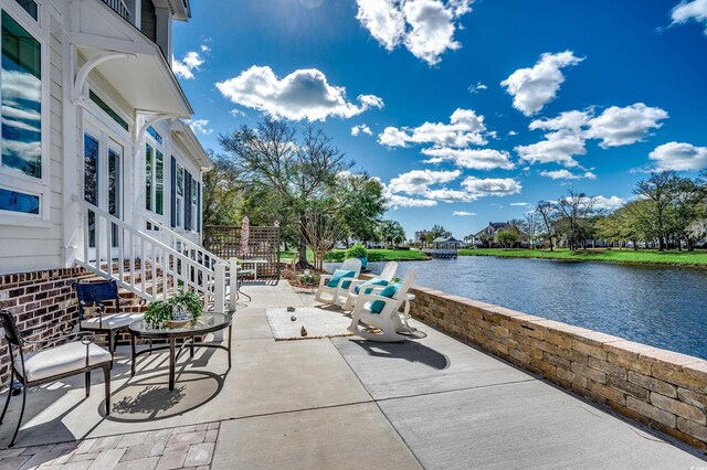 view of patio / terrace featuring a water view