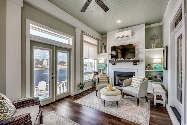 living room with wood ceiling, a large fireplace, dark wood-style floors, and a wall mounted AC