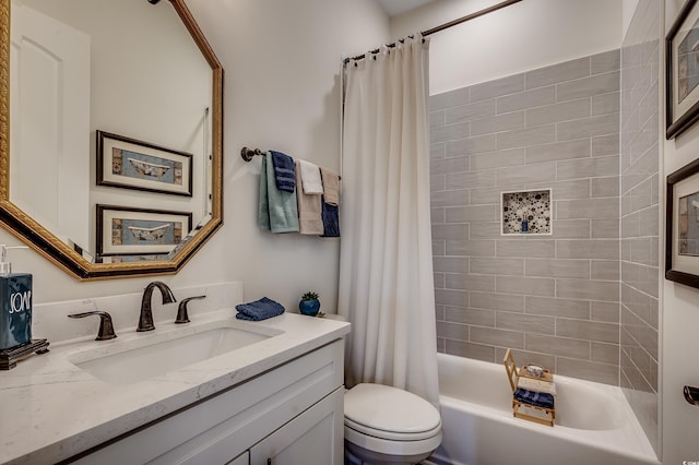 bathroom featuring shower / bath combination with curtain, toilet, and vanity