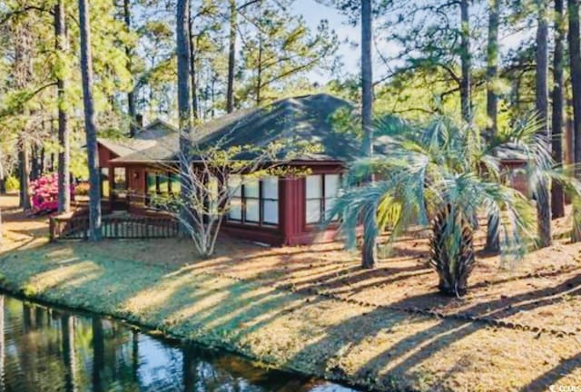 exterior space featuring a water view