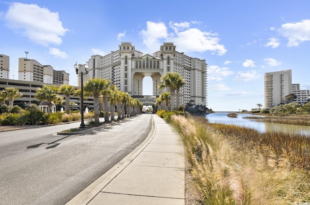 view of building exterior with a water view