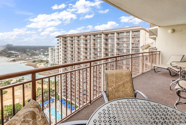 balcony featuring outdoor dining space