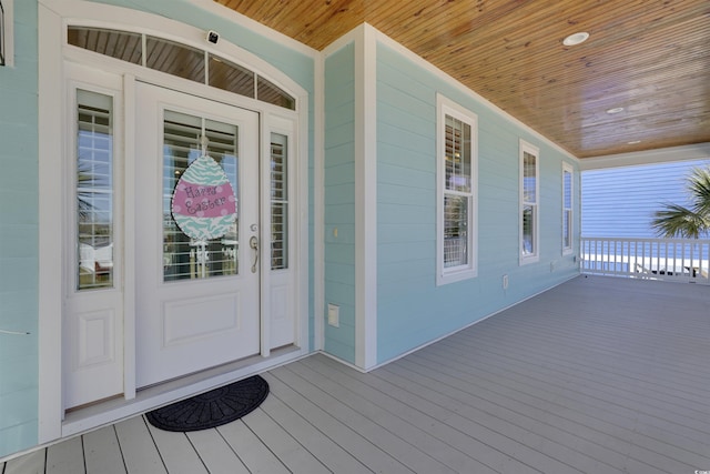 doorway to property with a porch