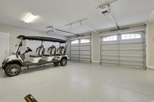 garage featuring a garage door opener