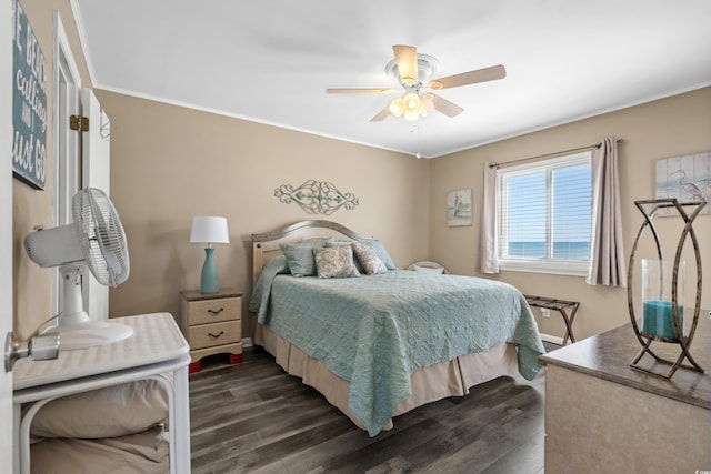 bedroom featuring dark wood finished floors and ceiling fan