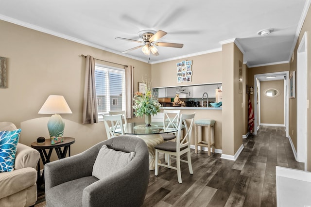 dining area with ceiling fan, dark wood-type flooring, baseboards, and ornamental molding