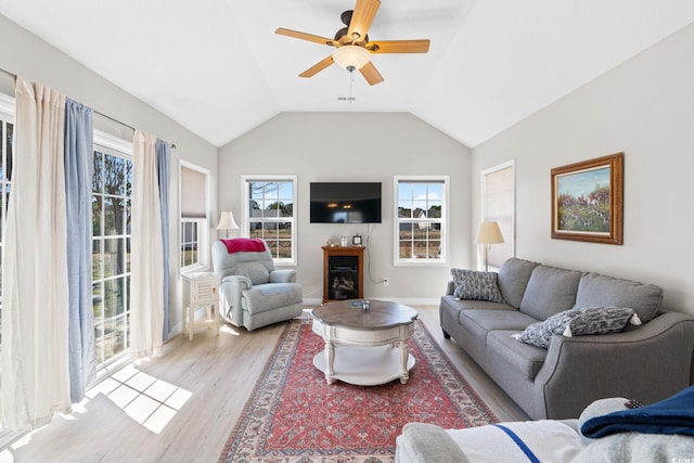 2029 Hawksmoor Dr, Conway, SC 29526 - living room with light wood finished floors, baseboards, vaulted ceiling, and ceiling fan