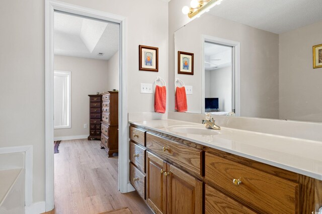 2029 Hawksmoor Dr, Conway, SC 29526 - bathroom featuring wood finished floors, vanity, and baseboards