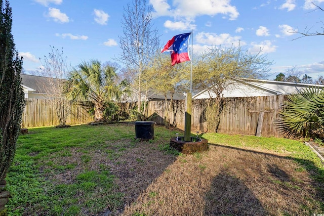 view of yard featuring fence