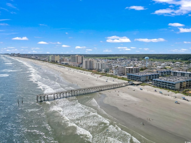 bird's eye view featuring a beach view and a water view