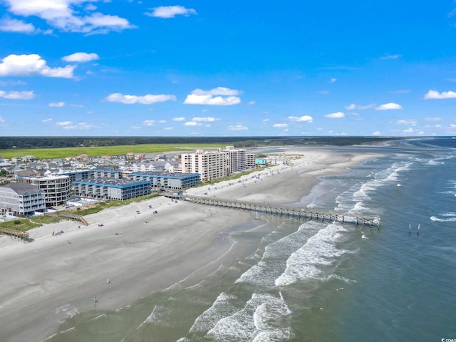 bird's eye view featuring a beach view and a water view