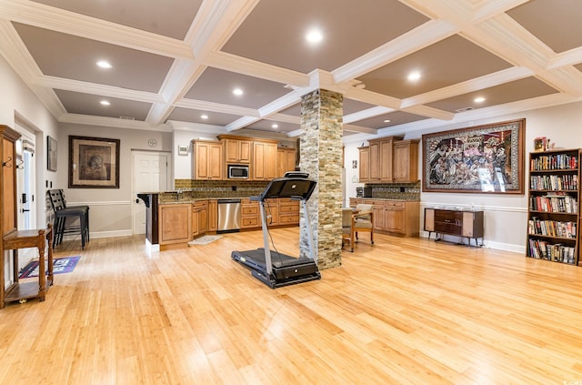 workout area with light wood-style flooring, coffered ceiling, recessed lighting, crown molding, and decorative columns