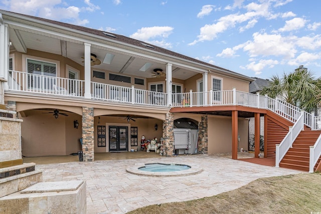 back of property featuring french doors, a patio, ceiling fan, and stucco siding